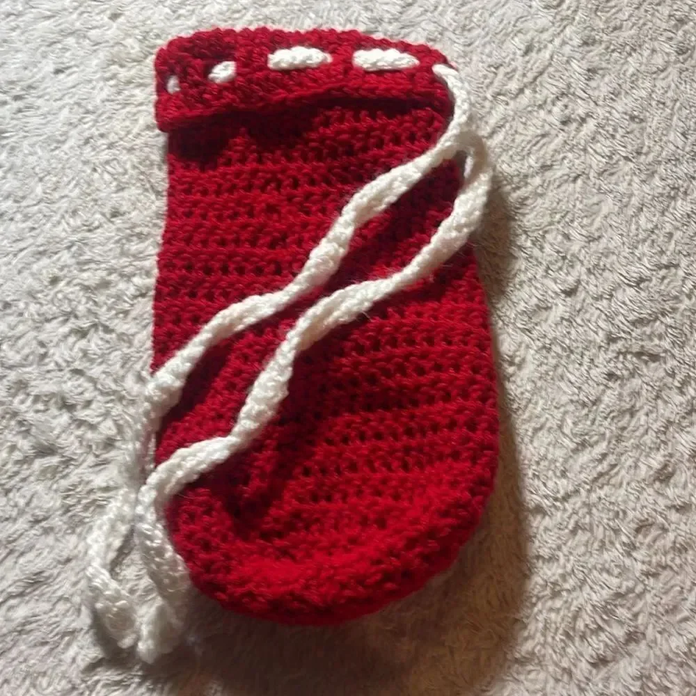 Hand knitted bottle cover